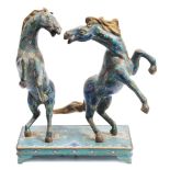 A Chinese cloisonne horse group: of two rearing horses, decorated with dragons,