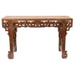 A Chinese carved wood altar table:, of large size, with a rectangular top,