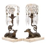 A pair of Regency gilt gesso table lights: each with cut glass petal shaped sconces,