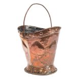 An Art Nouveau period copper coal scuttle by Benham and Froud: of oval tapering form with embossed