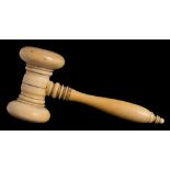 A late 19th/early 20th century ivory gavel: with ring turned head and handle, 12.5cm. long.