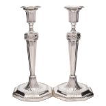 A pair of George V silver candlesticks, maker John Round & Sons Ltd,