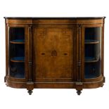 A Victorian walnut, inlaid and gilt metal mounted credenza:, of D-shaped breakfront outline,