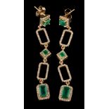 A pair of emerald and diamond mounted pendant earrings: each with square and rectangular links