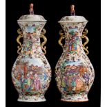 A pair of large Chinese famille rose porcelain export vases and covers: each of quadrilobed form