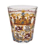 A Central European soda glass beaker: the vertically ribbed exterior enamelled in colours with an