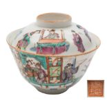 A Chinese porcelain bowl and cover: the exterior decorated in famille rose enamels with figures