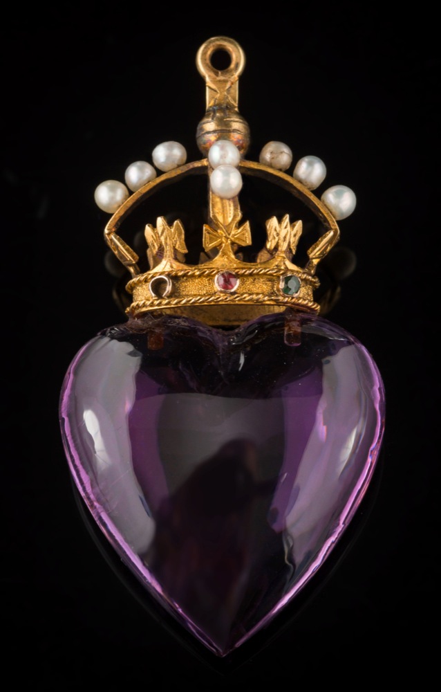 A late 19th/early 20th century amethyst heart-shaped pendant: with seed pearl and multi-gem-set