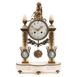 A French alabaster and gilt-metal mantel clock: the eight-day duration movement striking the hours