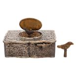 A German silver automaton musical box: the hinged lid enclosing a rotating singing bird,