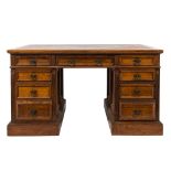 An Edwardian oak partner's desk:,