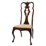 An Edwardian carved mahogany and inlaid occasional chair in the Queen Anne taste:,