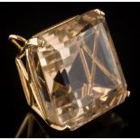 A large smoky quartz single-stone pendant: the square smoky quartz approximately 30mm wide in