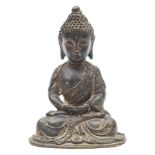 A small Chinese bronze Amitabha Buddha: seated in meditation with hands in dhyana mudra,