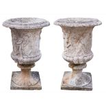 A pair of reconstituted stone garden urns: of campagna shape,