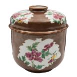 A Chinese famille rose 'batavian' ware jar and cover: decorated with leaf shaped panels of peonies,