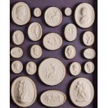 A collection of 19th century Grand Tour plaster cameo gems: contained in four fitted trays,