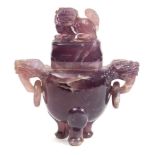 A Chinese amethyst quartz tripod censer and cover: with lion dog finial and similar loose ring