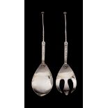 A pair of Iona silver salad servers, maker I.M.