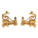 A pair of French gilt brass chenets:,