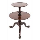 A mid 18th Century carved mahogany circular two tier graduated dumb waiter:,