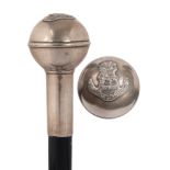A 20th century ebonised and silver plate mounted walking stick: the pommel with Prince of Wales