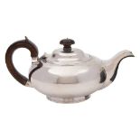 A George IV silver bachelor's teapot, maker's mark worn WB ?, London, 1822: of squat circular form,