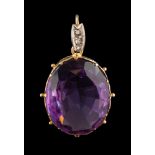 An amethyst single-stone pendant: approximately 21mm long x 17mm wide x 8.