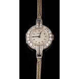 A lady's diamond mounted 'Vertex' cocktail wristwatch: the circular dial with Arabic numerals,