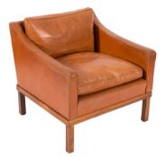 A Borge Mogensen leather and rosewood armchair:, of square shape,