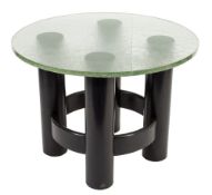 A 1950's Swedish glass and ebonised circular coffee table:,
