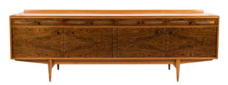 Robert Heritage for Archie Shine a rosewood and teak nine piece 'Hamilton' dining suite:,
