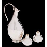 A pair of Stuart Devlin onion-shaped silver condiments, London,