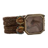 A late 19th century turquoise set gilt horse hair bracelet:,