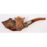 A meerschaum and amber horse racing themed pipe:, the bowl in the form of an inverted horse's hoof,