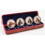 A set of four Edwardian silver framed watercolour horse portrait place name holders,