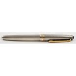 A silver Mont Blanc Meisterstuck fountain pen:, stamped 950 to cap with gilt clip and bands,