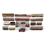 A group of Dinky road signs together with a collection of miscellaneous OO/HO scale rolling stock,