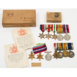 A WWI Royal Navy group of four together with two WWII family groups:,