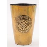 A Third Reich period Reichsarbiestdienst brass cup:, with raised Female Youth Camp emblem to body,
