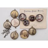 A collection of late 19th/ early 20th century silver and gold mounted souvenir buttons and badges