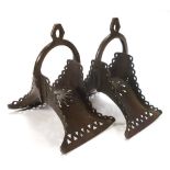 A pair of early 20th century Spanish brass stirrups:,