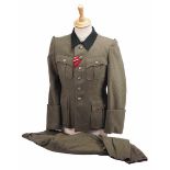 4.1.) Uniformen / Kopfbedeckungen Waffen-SS: Uniform eines SS-Offiziers.1.) Feldbluse: Feldgraues