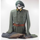 4.1.) Uniformen / Kopfbedeckungen Wehrmacht: Uniformnachlass eines Stabsapothekers.1.)