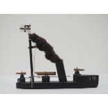 7.3.) Spielzeug Erzgebirge: Schnellboot der kaiserlichen Marine.Schwarz lackiertes Holz, mit drei