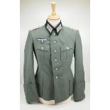 4.1.) Uniformen / Kopfbedeckungen Wehrmacht: Geschönte Feldbluse für einen Leutnant der Infanterie.