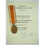 1.2.) Deutsches Reich (1933-45) Schutzwall Ehrenzeichen, mit Urkunde für einen Schüler aus Lychen.