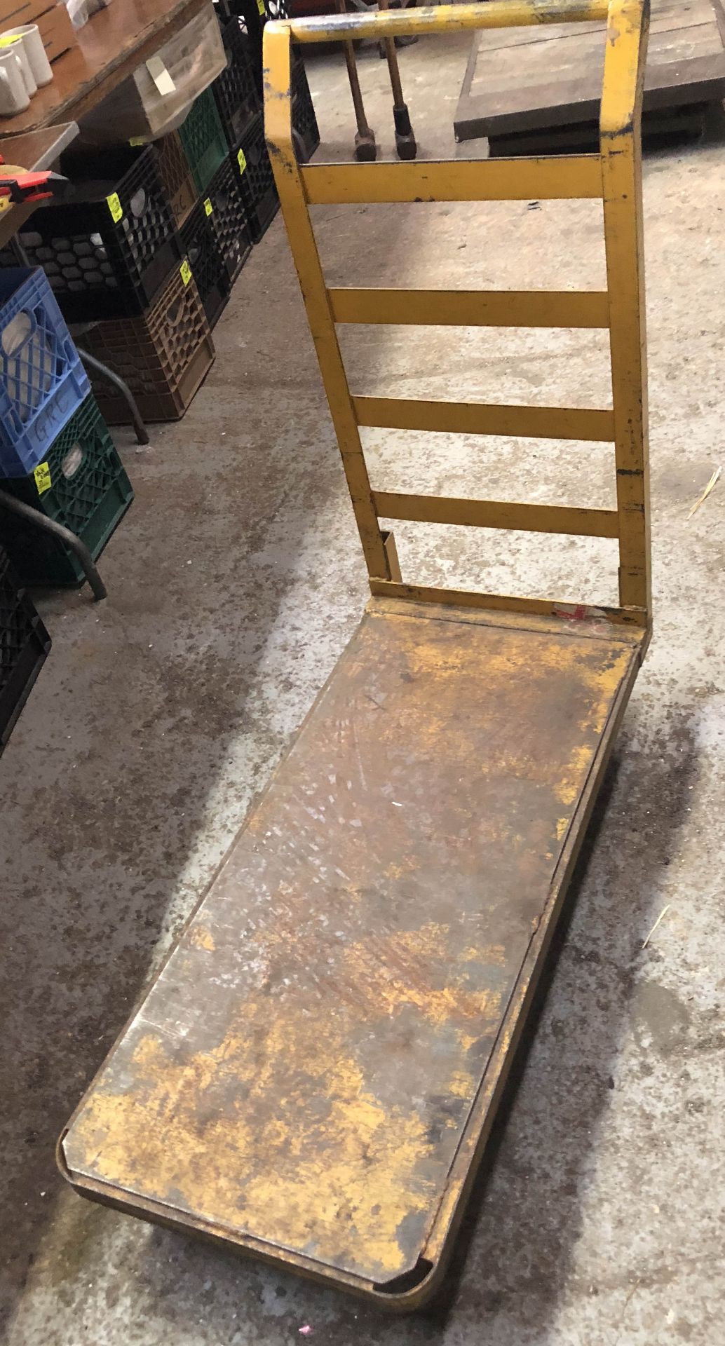 Yellow Metal cart measures 40" X 18"