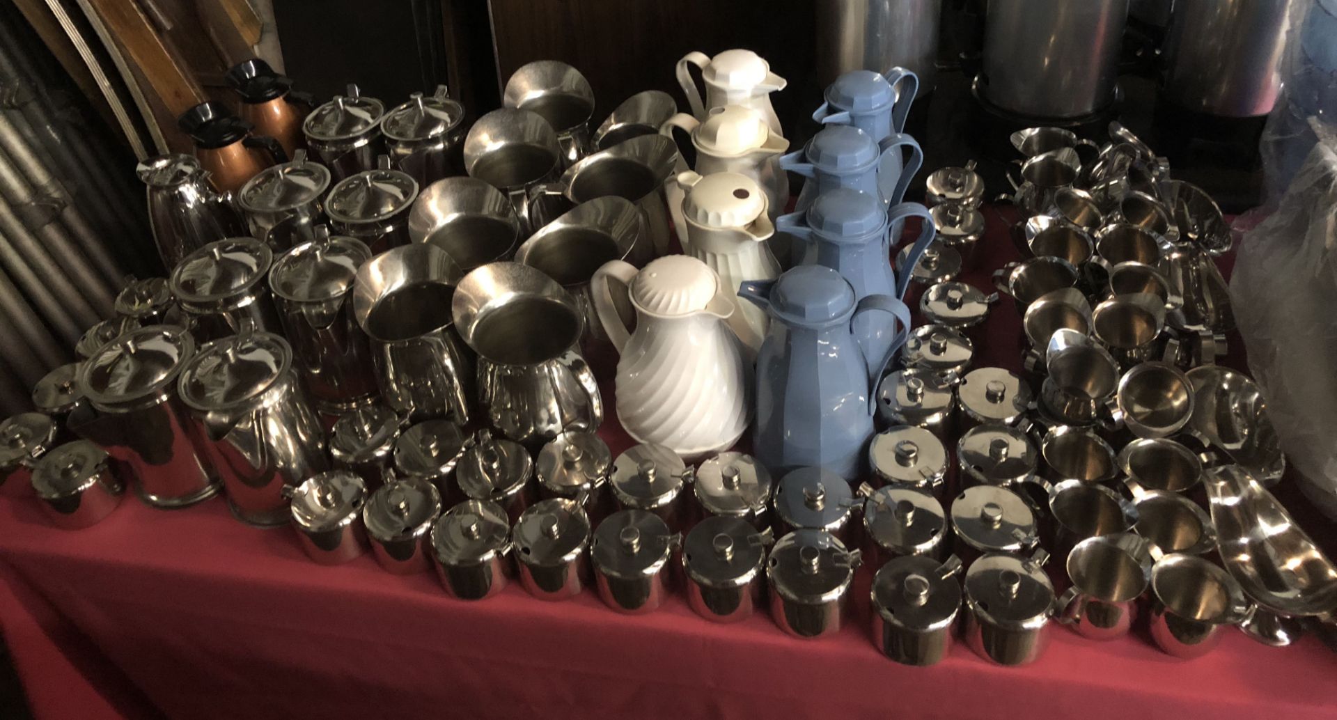 Lot 229 - set of 8 Stainless steel water pitchers