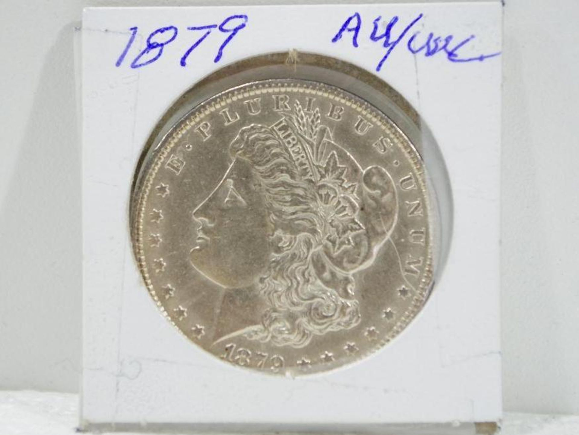 Morgan Silver Dollar, 1879 (appears almost uncirculated to UNC, ask to preview)